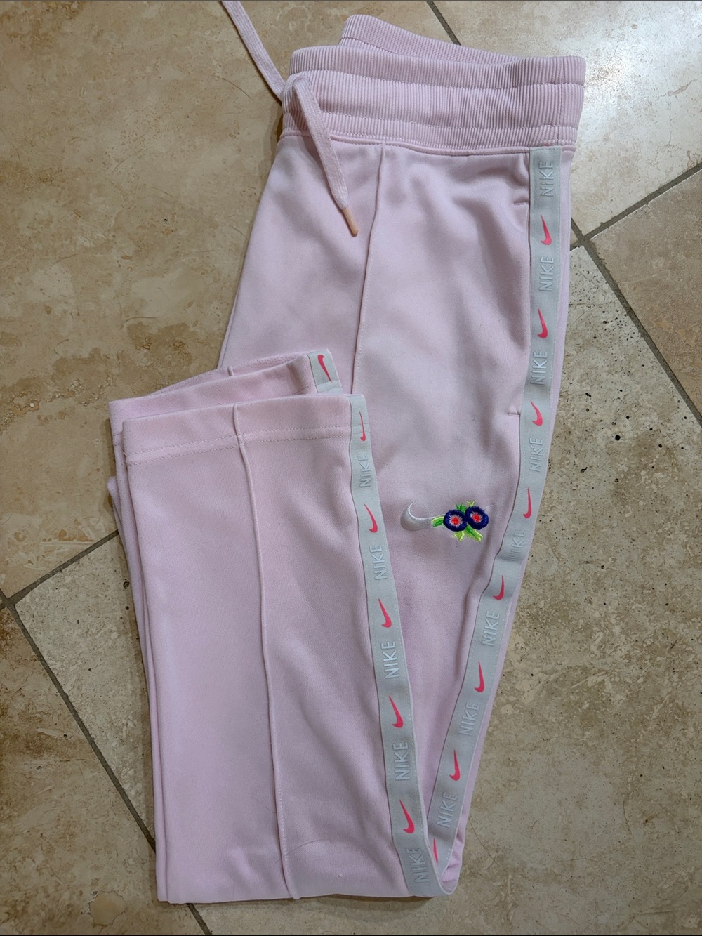 Nike Light Pink Track Joggers with Branded Side Tape and Floral Embroidery